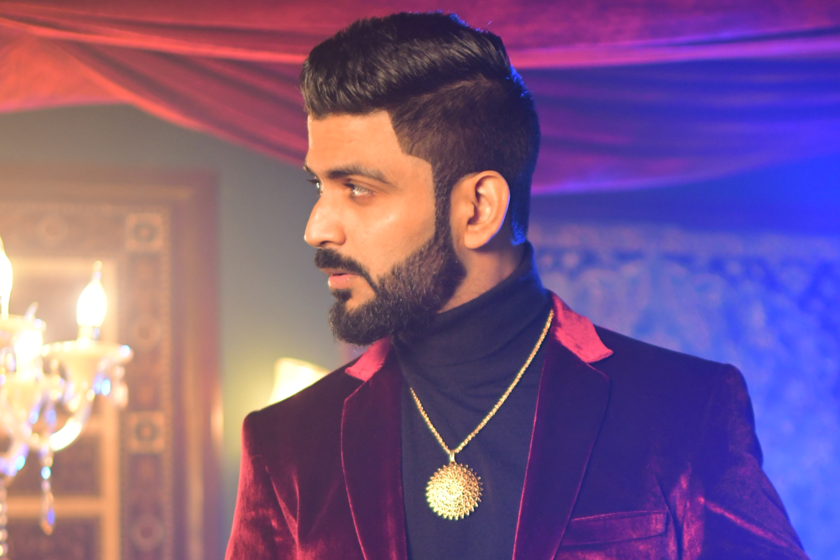 Jishant Malik in burgundy suit